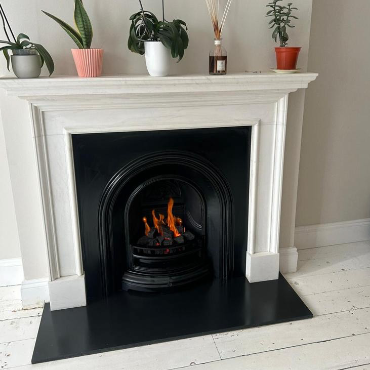 White marble "Canonbury" mantel, plain arch insert, gas fire